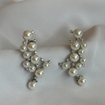 Brinco Earhook pérolas rodio