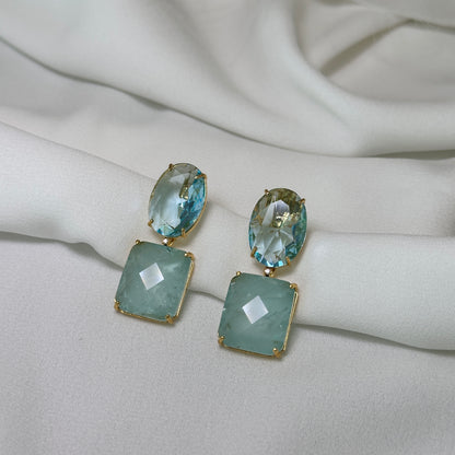 Brinco dourado com pedra fusion azul