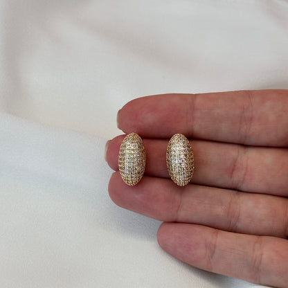 BRINCO OVAL CRAVEJADO DOURADO