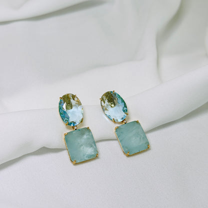 Brinco dourado com pedra fusion azul