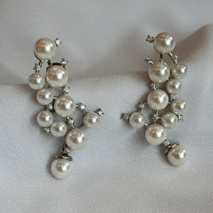 Brinco Earhook pérolas rodio