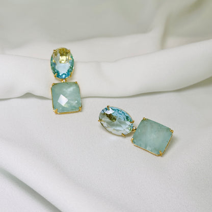 Brinco dourado com pedra fusion azul