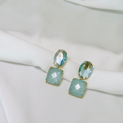 Brinco dourado com pedra fusion azul