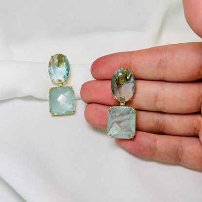 Brinco dourado com pedra fusion azul