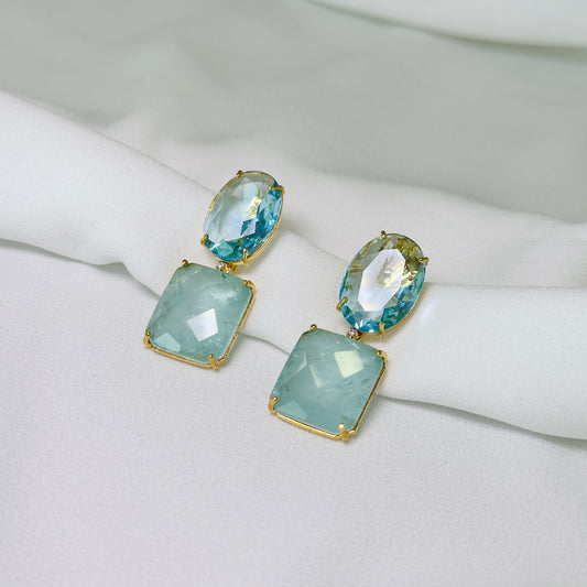 Brinco dourado com pedra fusion azul